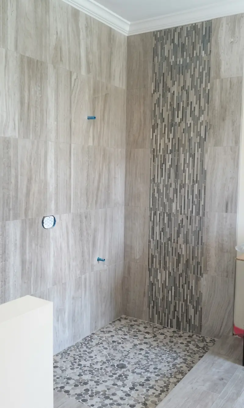 Bathroom Remodeling project by Accent Construction & Remodeling